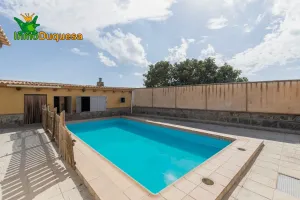 Terreno rústico en Alhendín(Con casita, piscina y huerto)